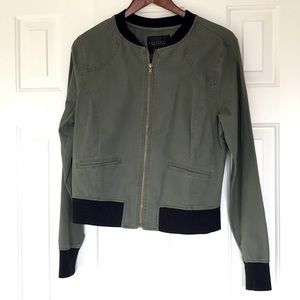 Green and black bomber jacket